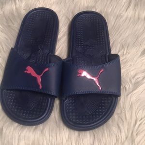 Blue and pink puma slides
